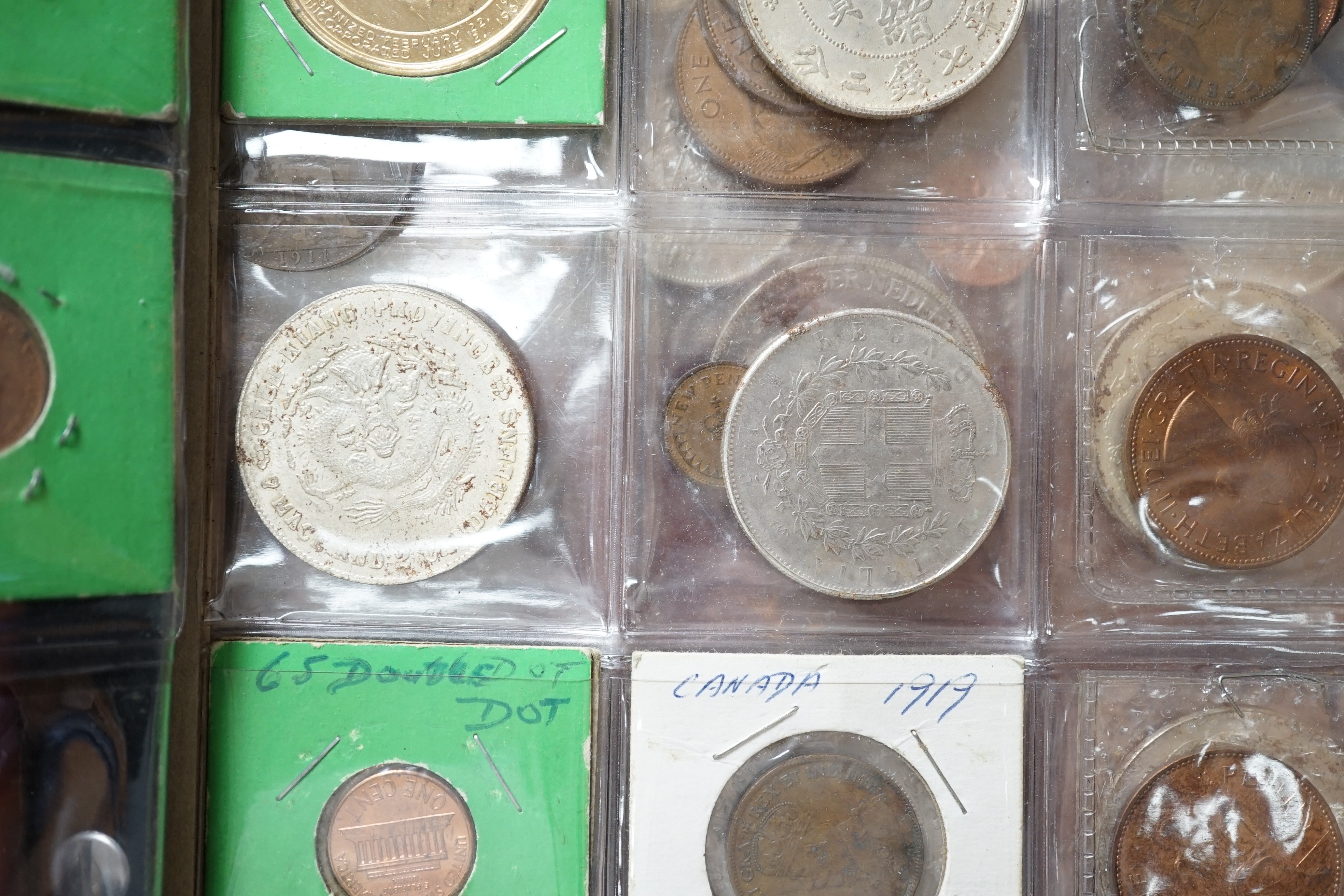 Coins in an album, including reproductions